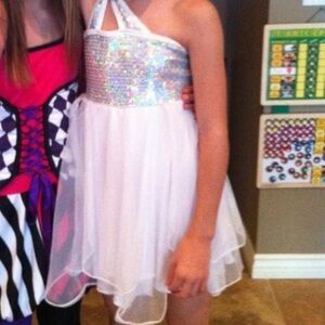White one shoulder girls dance costume with sequined top